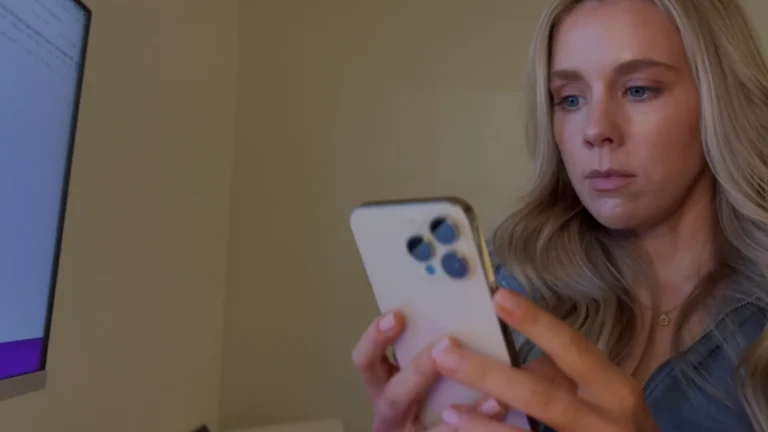 A professional camera on a tripod in a studio setting, representing the intentional process of turning content into authority.