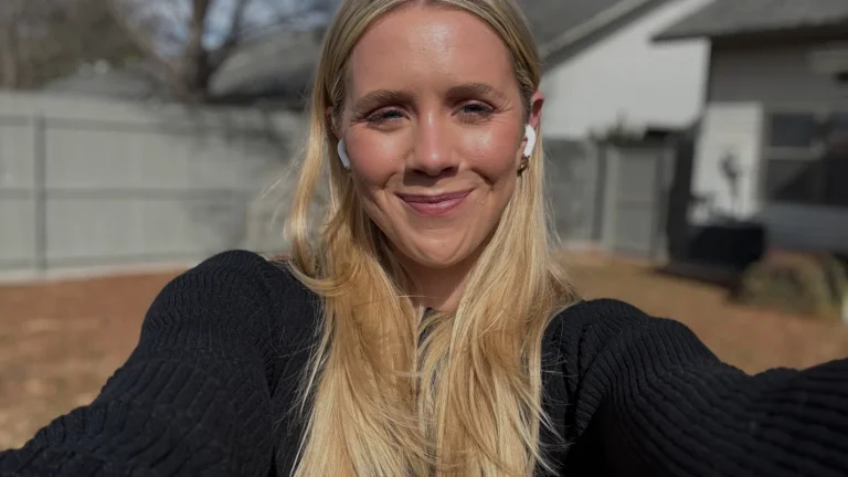 An artistic lifestyle photo of a professional looking out a window, representing the shift toward founder personal branding marketing in the trust economy.