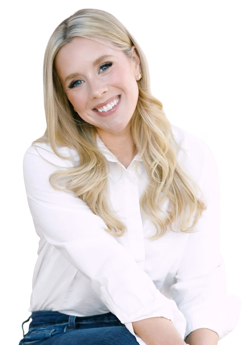 Professional portrait of Savannah Abney in a white blouse, smiling confidently, used to anchor her specific approach to intentional personal branding.
